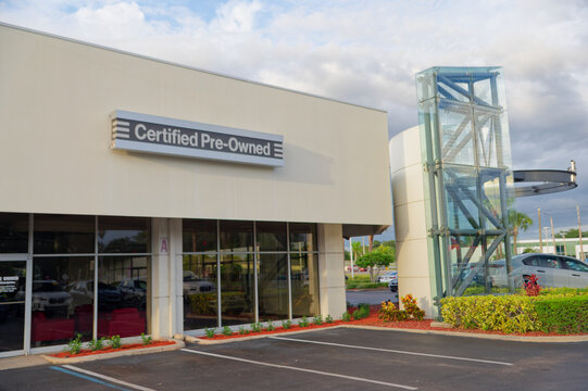 Bert Smith BMW dealership exterior with large branded sign Editorial Use Only October 4,  2026 St. Petersburg, FL ,USA reflective showroom windows and empty parking lot, conveying automotive retail, b