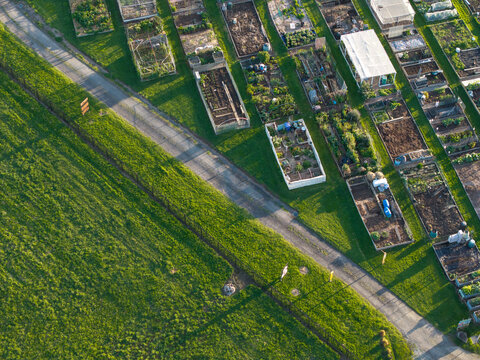 Aerial view of community garden plots with raised beds and pathways in Melbourne, VIC, Australia.