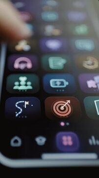 Finger explores colorful mobile growth dashboard controls