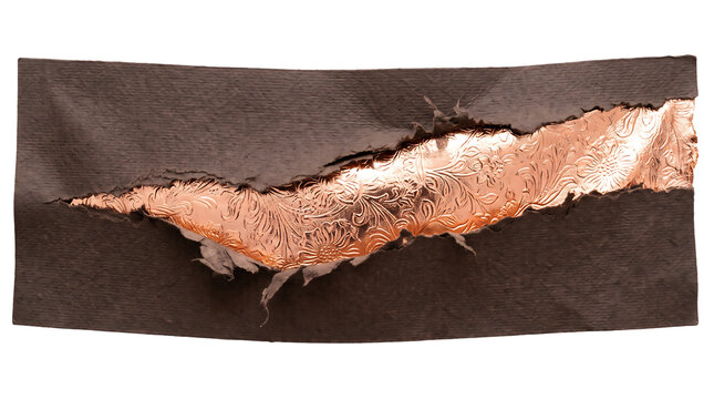 Textured metallic foil ribbon unrolling on fabric background for premium packaging design