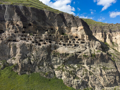 Vardzia, a sprawling rock-cut monastery complex and ancient cave city, embedding a significant historical landmark into erusheti mountain in Georgia
