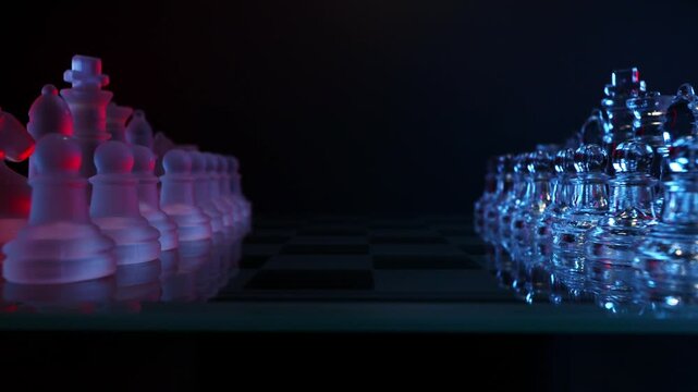 Super close-up dolly back shot showcasing detail and strategy on a modern glass chessboard.