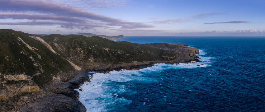 Aerial view of The Gap, a dramatic coastal rock formation with crashing waves, rugged cliffs, and deep blue ocean in Torndirrup, Western Australia, Australia.
