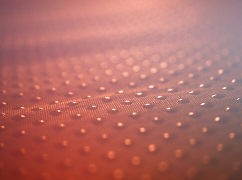 Illuminated dots surface dramatic focused bokeh