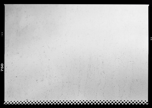 Black and white dirty film scan texture backdrop