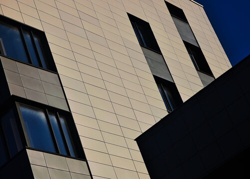 Office building illuminated by sunshine backdrop