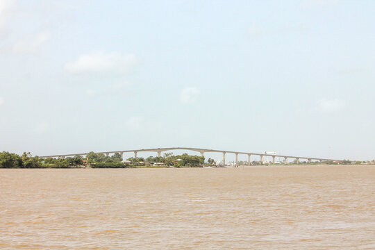Exterior view of the Jules Wijdenbosch Bridge spanning the Suriname River, connecting the capital city of Paramaribo on the west bank with Meerzorg in the Commewijne District on the east bank