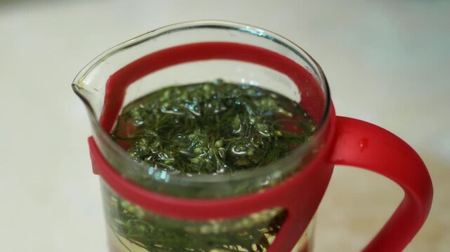 Cannabis tea herbal with cannabis leaf marijuana leaves herb, Health tea with hemp leaf plant THC CBD herbs