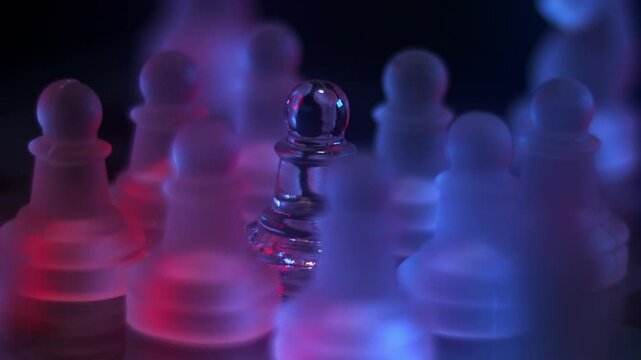 Glass pawns rotating around a trapped pawn, symbolizing oppression and isolation under red and blue neon lighting, macro close-up shot