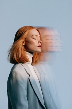 Redhead woman threefold motion blur portrait with multiple exposure streaks for fashion background and portrait artwork
