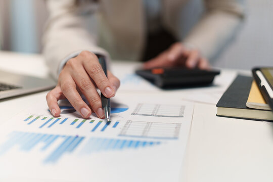 Business Analyst Reviewing Financial Charts During Online Meeting