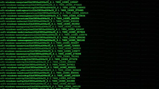 Green computer code scrolling down rapidly across a dark screen display in this motion background footage
