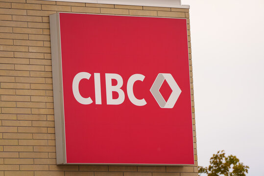 CIBC Canadian bank close up red and white logo on a brick wall