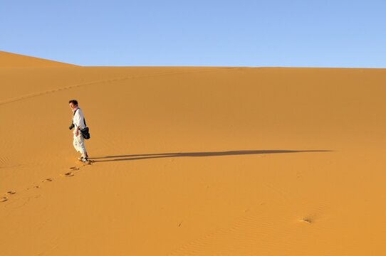 Woman (50-55), desert trekking, Erg Chebbi, Morocco