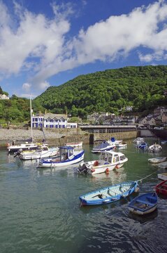 Small boats in natural harbour, green landscape, Lyndmouth, Devon, Great Britain