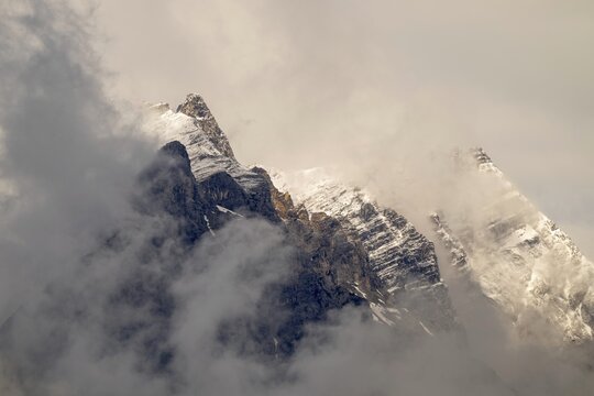 Small and large Bettelwurf with a thin layer of snow, behind wispy clouds, Small and large Bettelwurf, Karwendel Mountains, Tyrol, Austria
