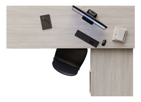 A top view of a modern desk showing a computer with a black keyboard and mouse. A notebook and pen are placed nearby, with an empty chair beside the