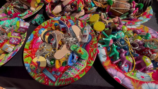 Traditional Pakistani Handcrafted Keychains with Truck Art and Khussa Designs at Lok Virsa Islamabad