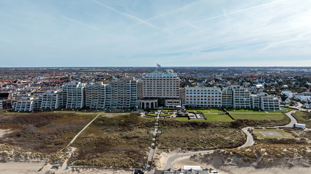 Aerial view of Grand Hotel Huis ter Duin situated on the dunes overlooking the North Sea coast in Noordwijk, Zuid-Holland, Netherlands.