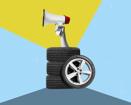 car tire on free On isolated flat background. And a hand holding a megaphone.