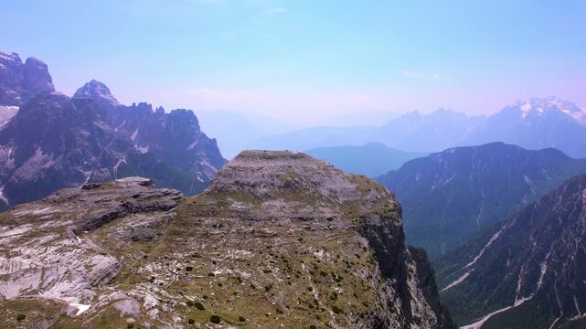 Aerial view of Dolomite mountains, the Alps, Italy (Tre Cime di Lavaredo или Drei Zinnen)Three Peaks of Lavaredo