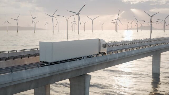 Elevated Side Tracking View of Semi Truck Crossing Wind Farm Bridge
