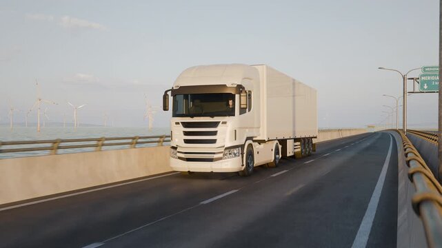 Low Front to Side Tracking Shot of Semi Truck Beside Wind Farm