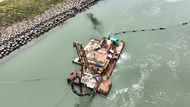 Aerial of dredging equipment on the coast of Taiwan.