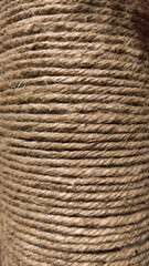 Jute rope natural fibers brown rough texture wrapped around abstract background © Muhammad
