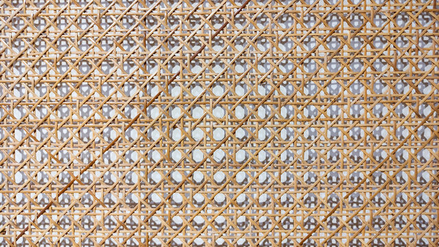 Wicker rattan webbing texture seamless brown background