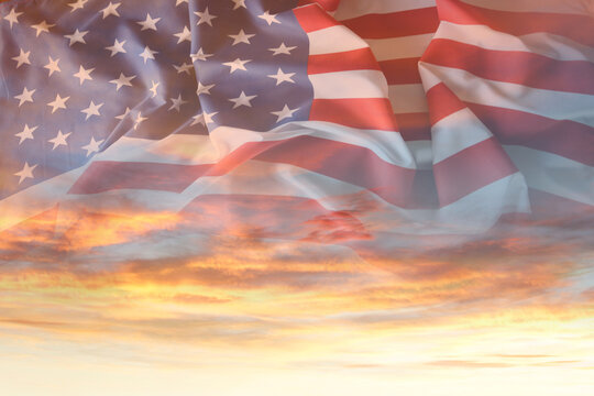 US flag in sunny sky