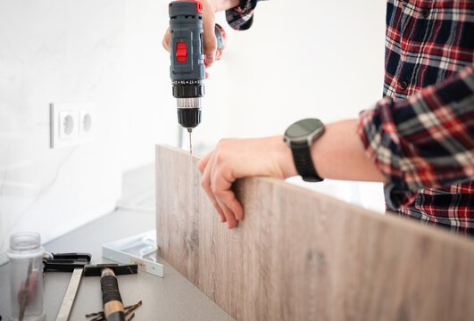 Assembling furniture with a power drill