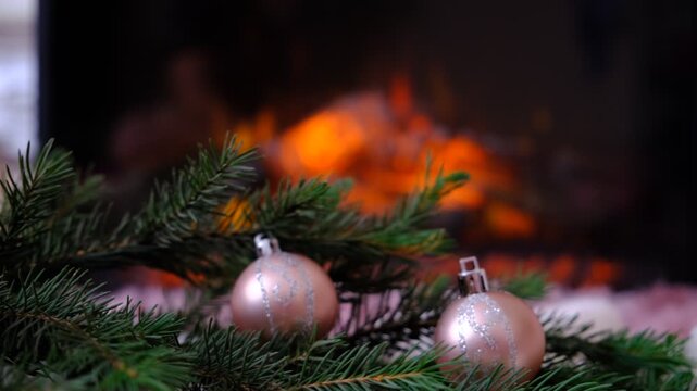 Christmas tree and decorations. Magic of the holiday season. Warm string lights twinkle gently, casting a golden glow. Fireplace and flame adds comforting warmth and the subtle scent