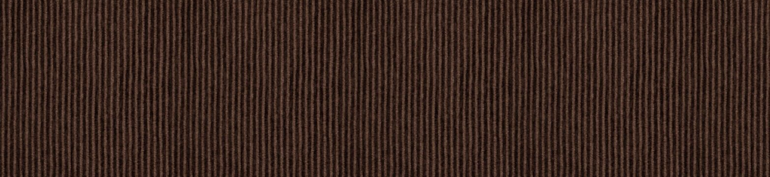 Dark brown corduroy fabric surface displaying fine vertical ribbed weave texture for banner