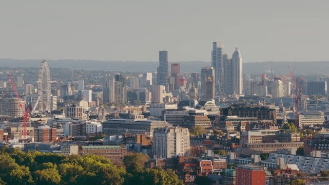 London Skyline With Observation Wheel and Modern High Rise District Aerial Drone Shot Long Lens