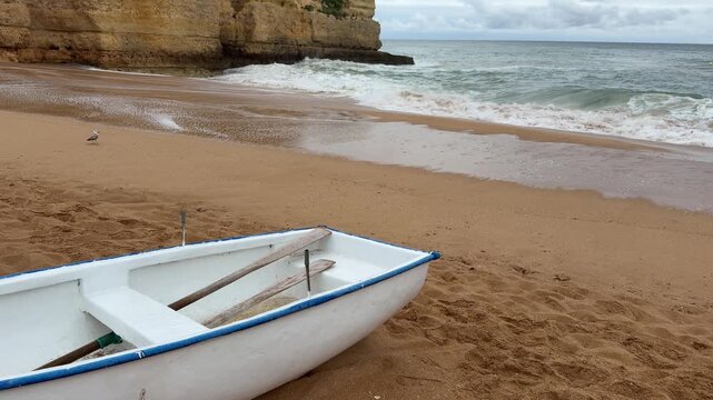 white boat on beach ocean waves cliff, copyspace banner, concept of travel tourism