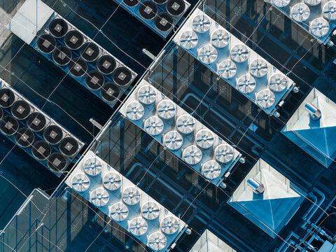 Aerial view of the cooling system on the roof of a modern AI data center for GPU computing in Warsaw, Masovian Voivodeship, Poland.