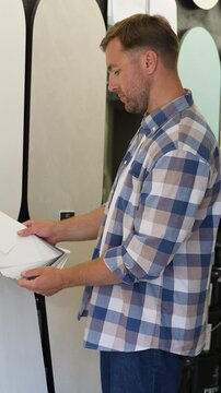 Interior designer selecting paint color samples