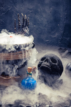 Red potion bottle sits in white mist.