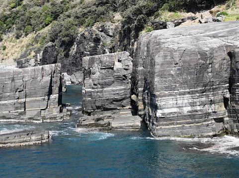 Susa Hornfels coastal rock formation under a clear blue sky in Hagi, Yamaguchi, Japan