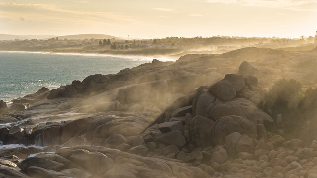 Moody afternoon light with sea spray on the rocks in Port Elliot South Australia looking towards Rocky Bay and Green Bay