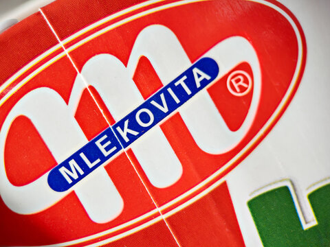 WARSAW, POLAND - MAY 7, 2026: Macro shot of Mlekovita brand logo on package