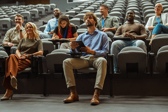 Diverse audience attending a business seminar or lecture