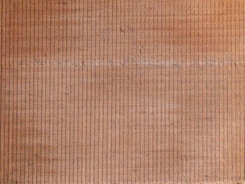 Aerial view of the fine linear texture of a wooden surface with vertical grain patterns in Western Cape, South Africa.