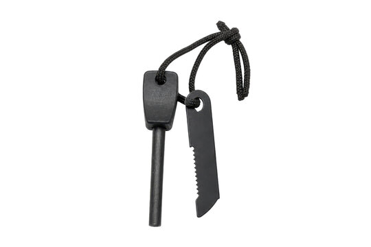 Black metal fire starter with a serrated striker and paracord lanyard is captured in a studio shot on a clean white background