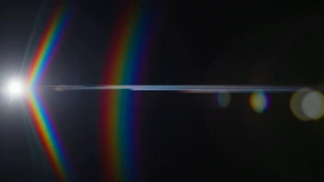 Dynamic rainbow lens flare light leak animation on black background, for creative visual, effects spectrum