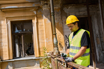 Fototapeta premium Administrator in charge of cleaning and restoring heritage locations