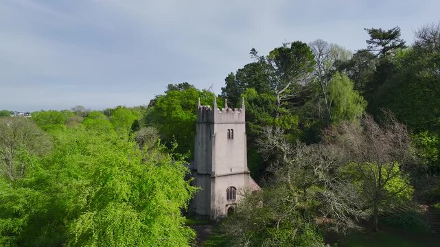 Cockington Church and Cockington Court from a drone, Cockington Country Park, Torquay, Devon, England, United Kingdom