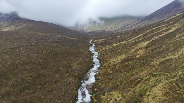 Eas a' Bhradain Waterfall from a drone, Blackhills Waterfall, Loch Ainort, A87 road, Isle of Skye, Scotland, England, United Kingdom