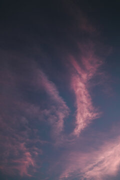 View of pink sunset clouds over Vormsi in Laane County, Estonia.